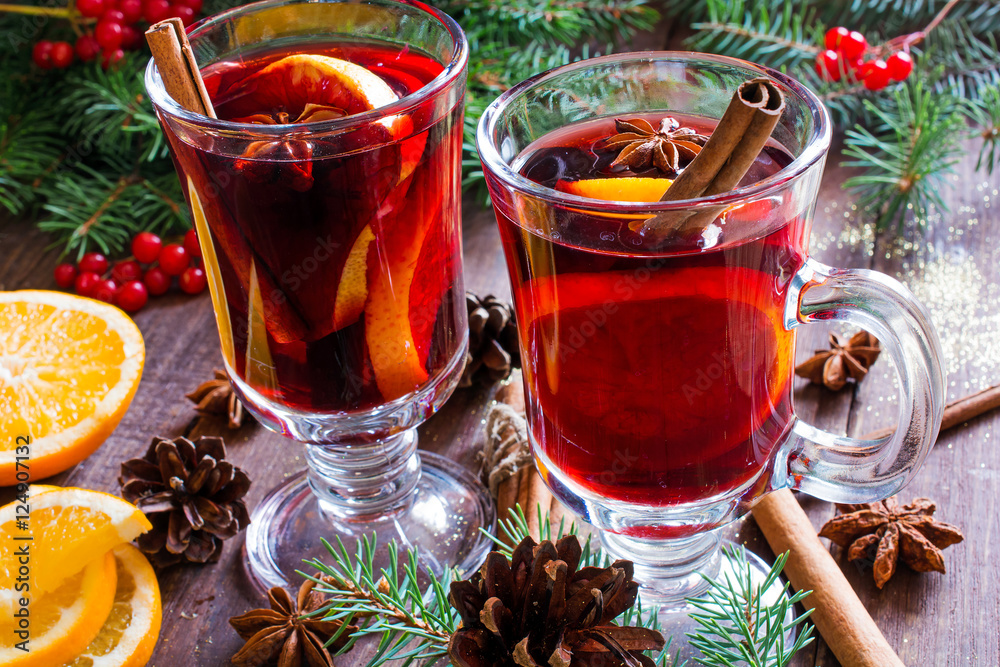 hot christmas mulled wine with cinnamon sticks, anise and orange hot christmas mulled wine with cinnamon sticks, anise and orange