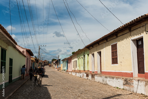 Wires over street houses in residential area in Trinidad, Cuba