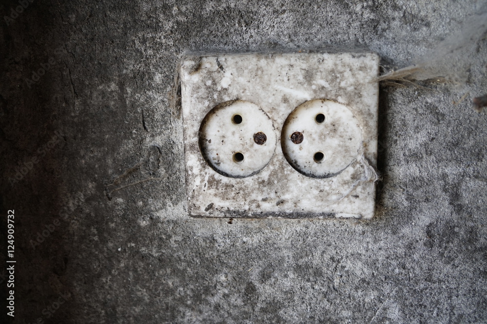 Closeup of old dirty double electrical outlet Closeup of old dirty double electrical outlet