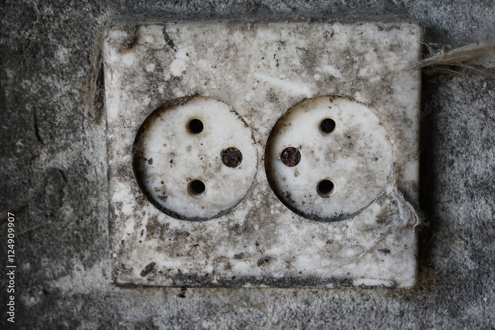 Closeup of old dirty double electrical outlet Closeup of old dirty double electrical outlet