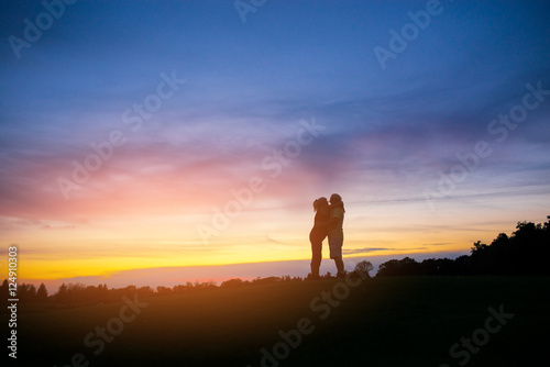 Couple on sky background. Two people standing and hugging. Feel the tenderness. My heart is yours. © DenisProduction.com