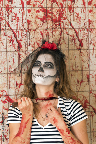 Young girl ready to celebrate Halloween photo