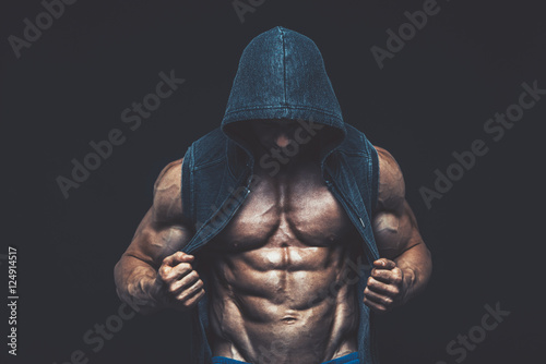 Man with muscular torso. Strong Athletic Men Fitness Model