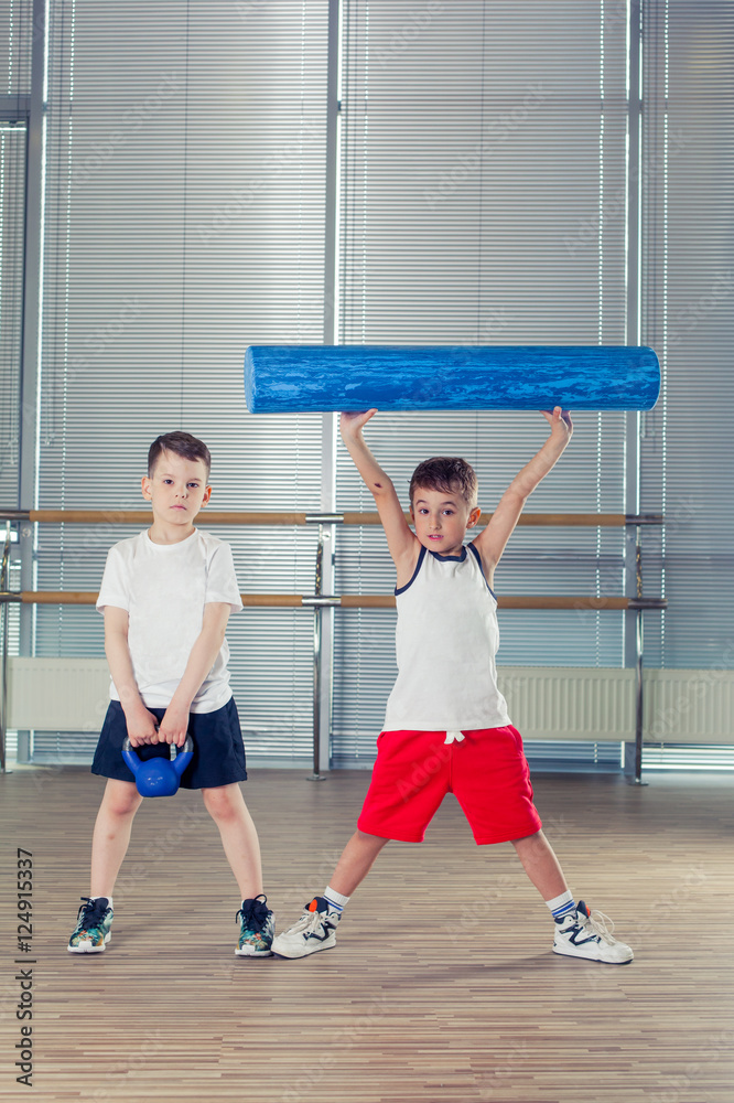 fitness, sport, training lifestyle concept - children in the gym