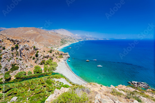 Panorama of Preveli beach at Libyan sea, river and palm forest, southern Crete , Greece photo
