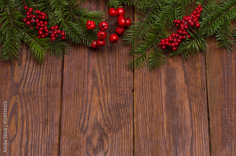 Christmas fir tree on wooden background Christmas fir tree on wooden background