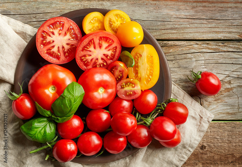 plate of various colorful tomatoes