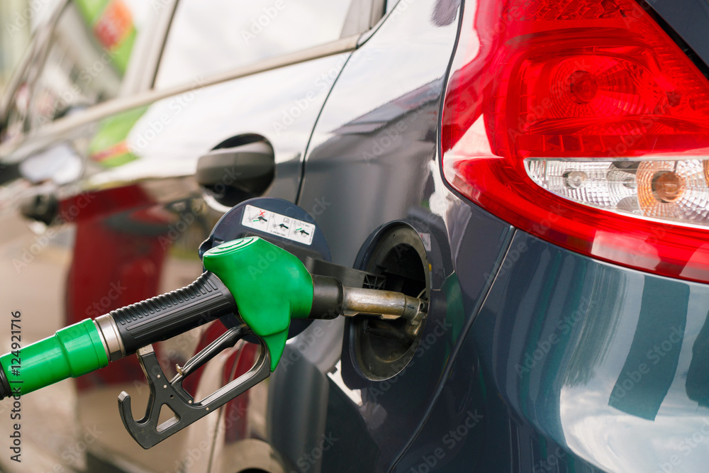 Car refueling on a petrol station Car refueling on a petrol station