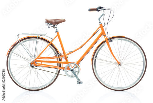 Stylish womens orange bicycle isolated on white