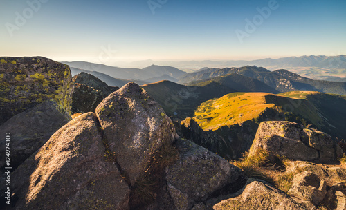 Evening Mountain Landscape with Rocks in Foreground. View from Mount Dumbier in Low Tatras National Park, Slovakia. © kaycco