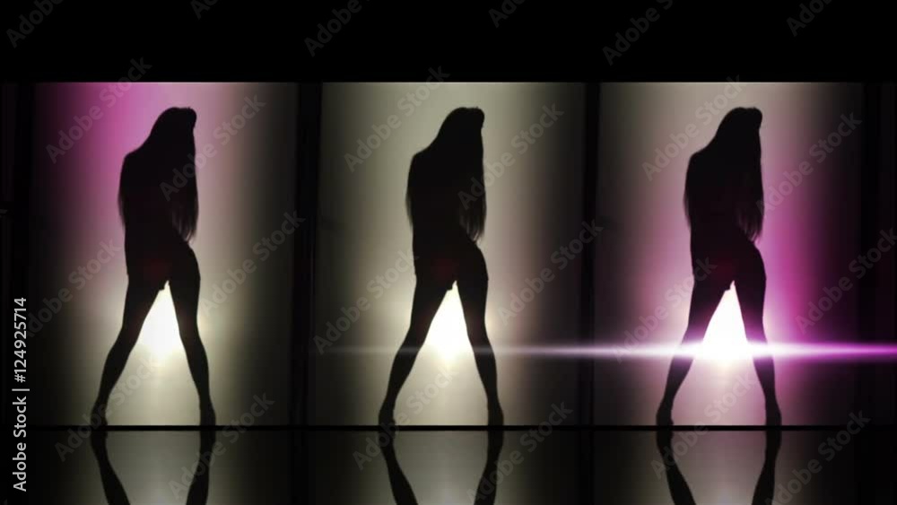 A silhouette of beautiful girls woman dancing combination. Against colored & gray background.
