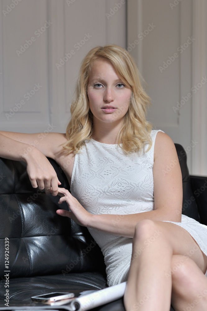 Daydreaming woman on couch Daydreaming woman on couch