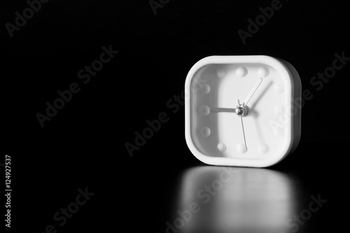 low key object of white alarm clock