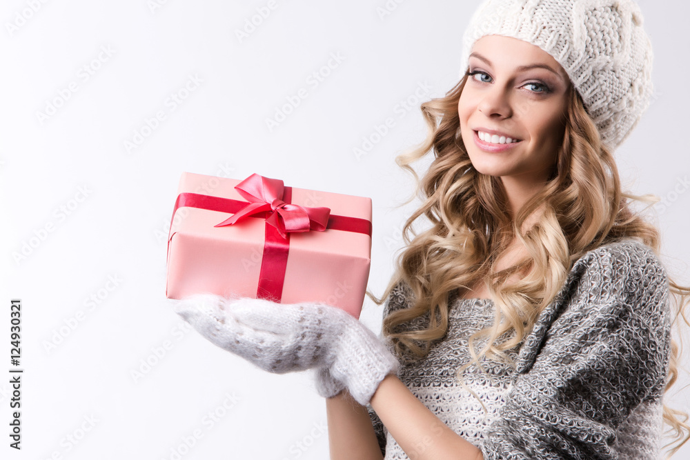 Happy woman with gift box in hands. Happy woman with gift box in hands.