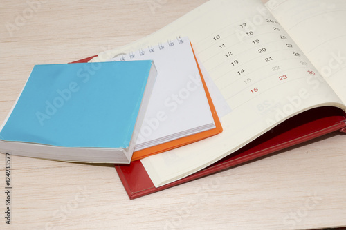 group of note on wooden desk,white paper,copy space, colorful of note