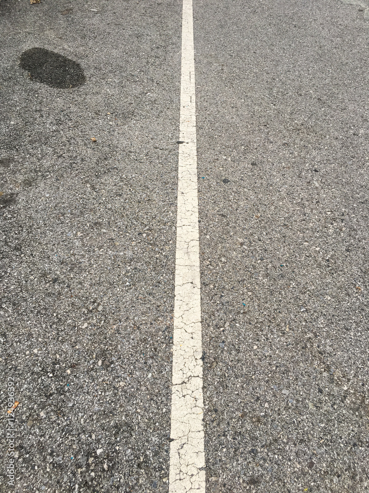 sphalt road with white line in the center background sphalt road with white line in the center background