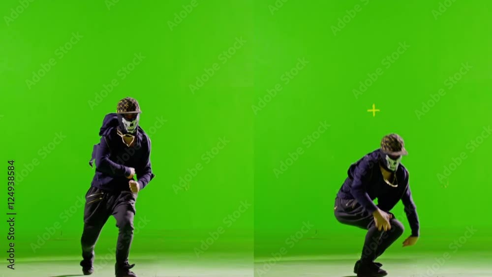 Professional Hip Hop break dance. In mask. Dancing on Green screen. Few shots. Slow motion. Professional Hip Hop break dance. In mask. Dancing on Green screen. Few shots. Slow motion.