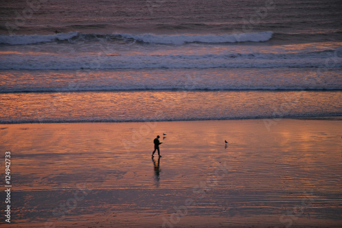 Photography ppl on beach w ocean sunset