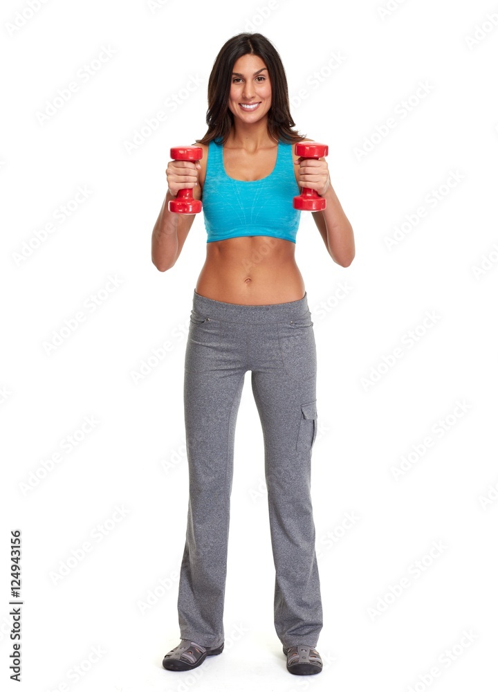 Athletic girl with dumbbells.