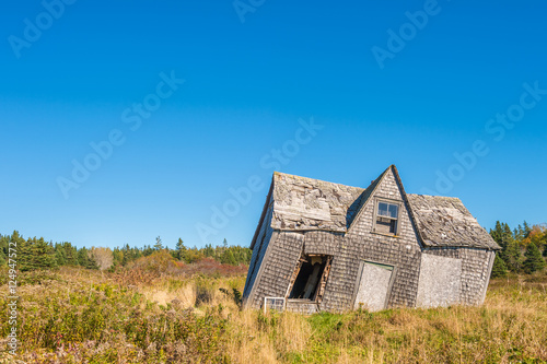 crooked leaning old house