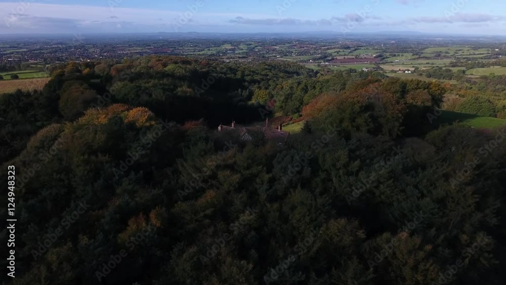 Aerial view of a secluded house in the countryside.