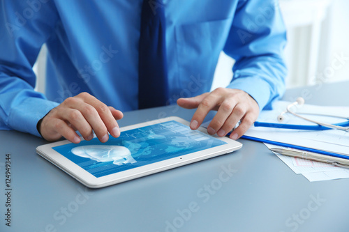 Cardiologist working with t...