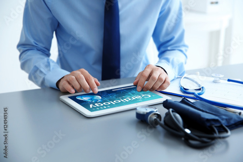 Cardiologist working with t...