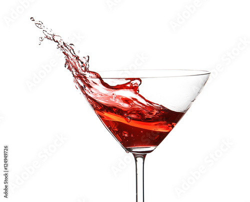Red cocktail with splash on white background