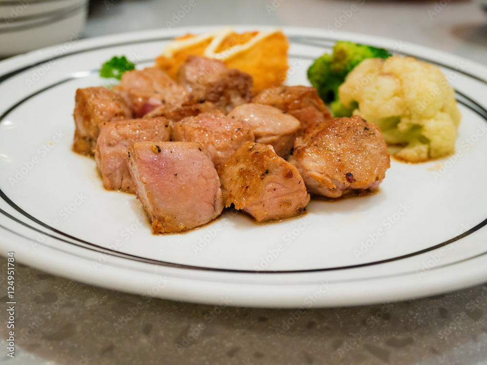 beef steak on white plate beef steak on white plate