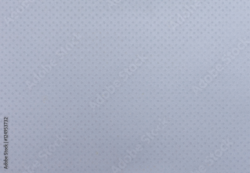 Abstract dot pattern on grey paper background