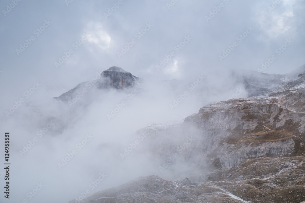 Misty mountain scene in Dolomites mountain