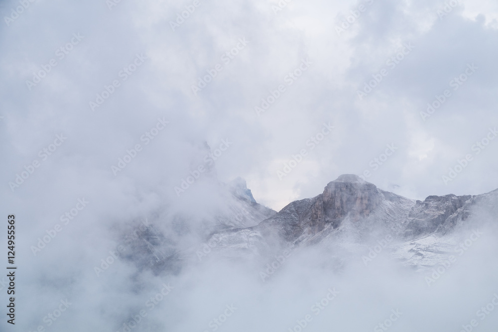 Misty mountain scene in Dolomites mountain Misty mountain scene in Dolomites mountain