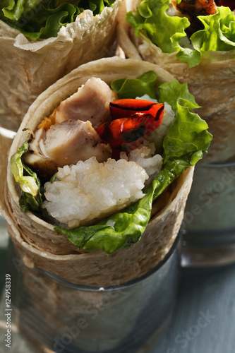 Burittos with rice and chicken closeup photo