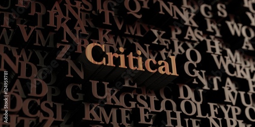 Critical - Wooden 3D rendered letters/message. Can be used for an online banner ad or a print postcard.