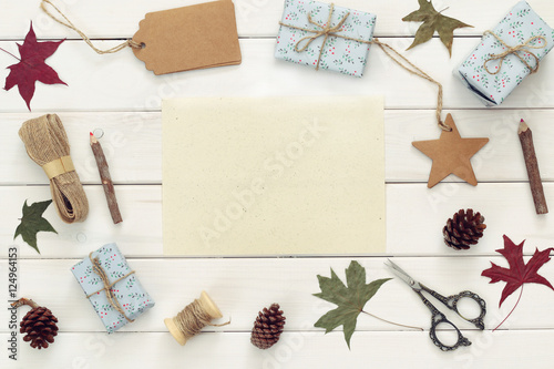 Christmas presents wrapping over wooden table