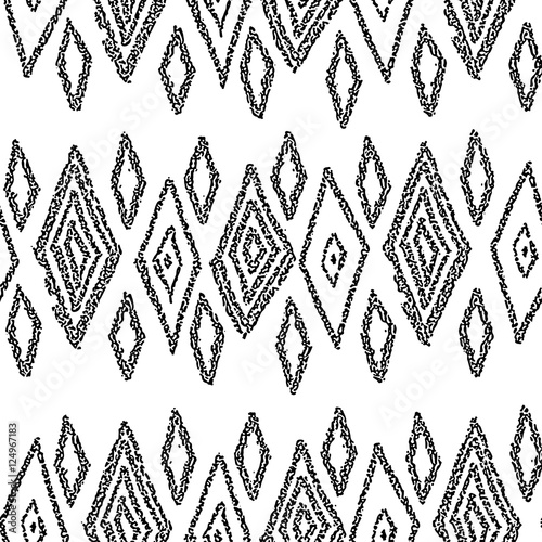 Pattern of rhombuses.Traditional ethnic pattern. Brushwork by hand. Black and white vector image.Bo-ho style.Vector template for printing on fabric,seamless surfaces and wrapping paper.