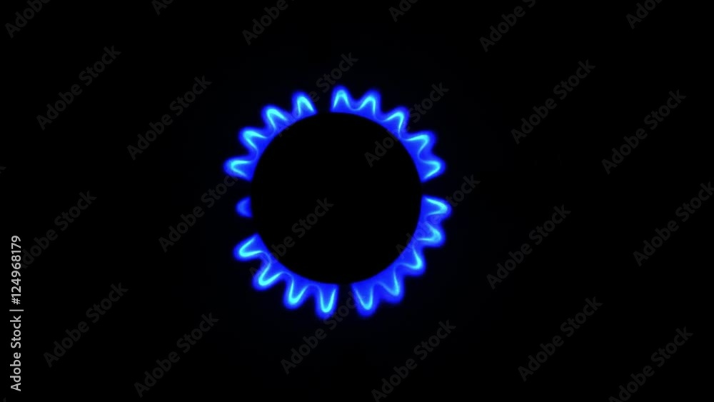Burner gas stove close-up. Gas burns with a blue flame. Burner gas stove close-up. Gas burns with a blue flame.