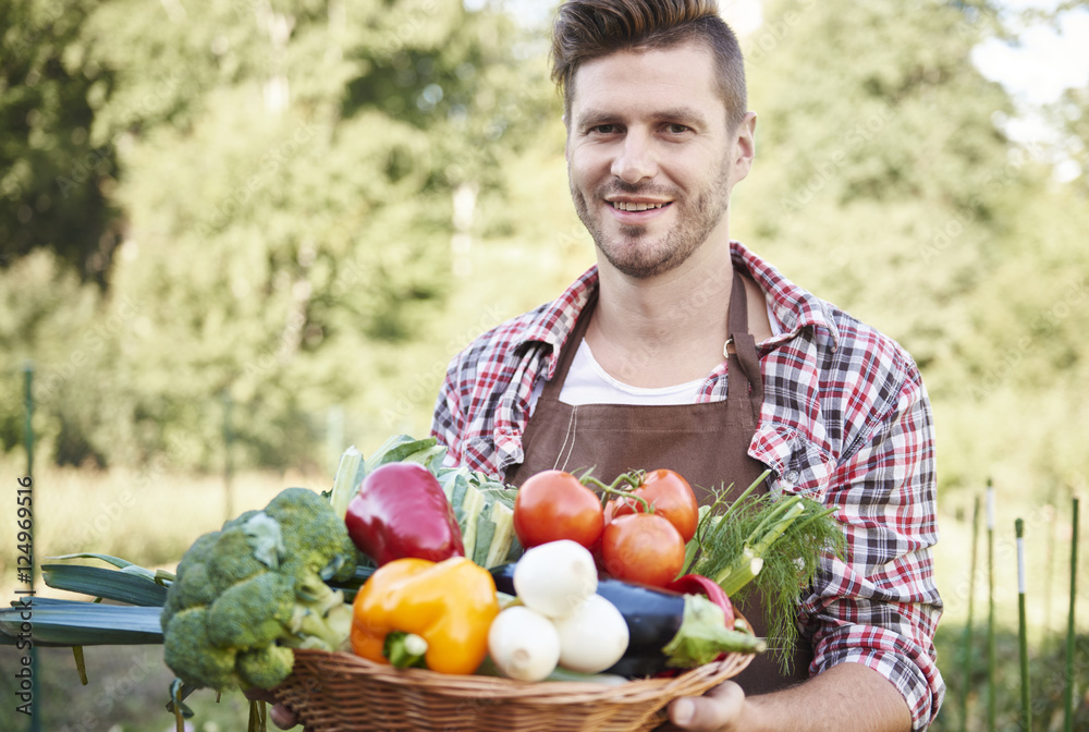 Man with basket full of vegetables Man with basket full of vegetables