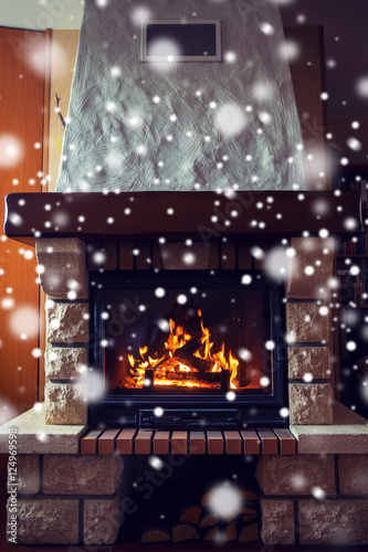 close up of burning fireplace with snow © Syda Productions