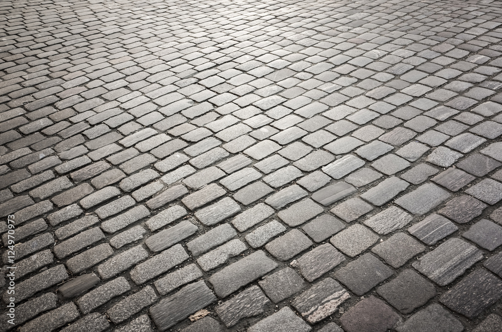 Dark gray cobble road background Dark gray cobble road background