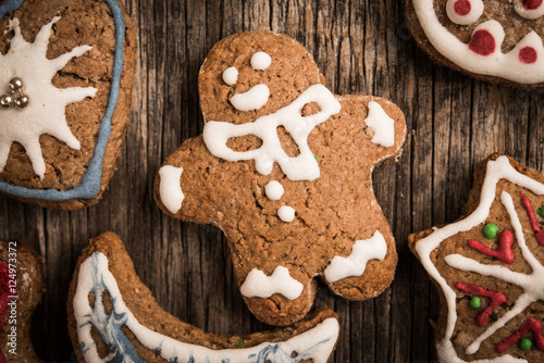 Background of gingerbread cookies decorated with sugar icing