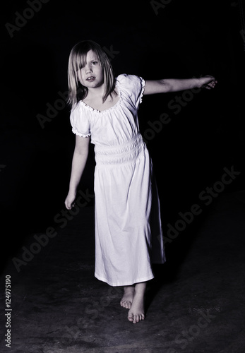 Girl wearing a white nightgown