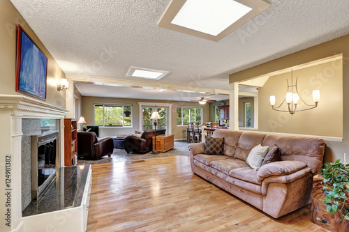 Open plan family room with hardwood floor