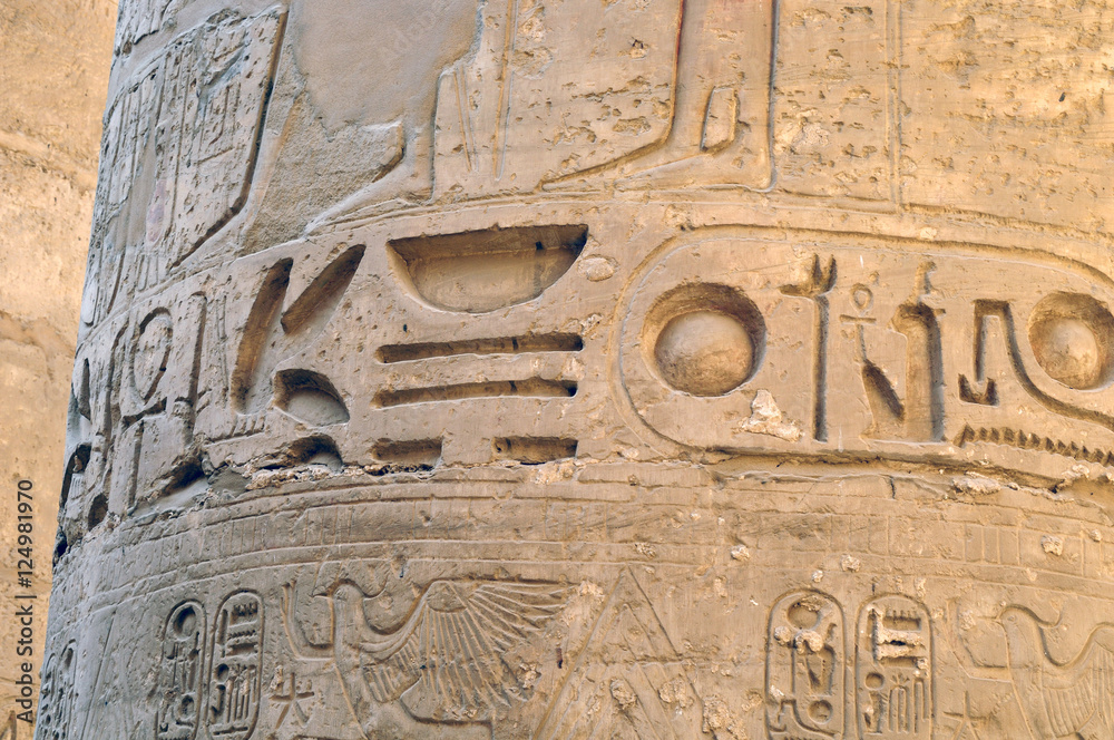 Ancient Egypt. The columns are decorated with carved hieroglyphs. Karnak Temple. Luxor. Thebes.