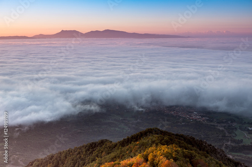 Amanecer con niebla desde Bellmunt, Catalunya photo