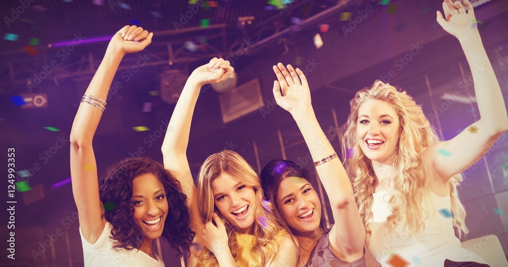 Composite image of pretty girls with arms up Composite image of pretty girls with arms up