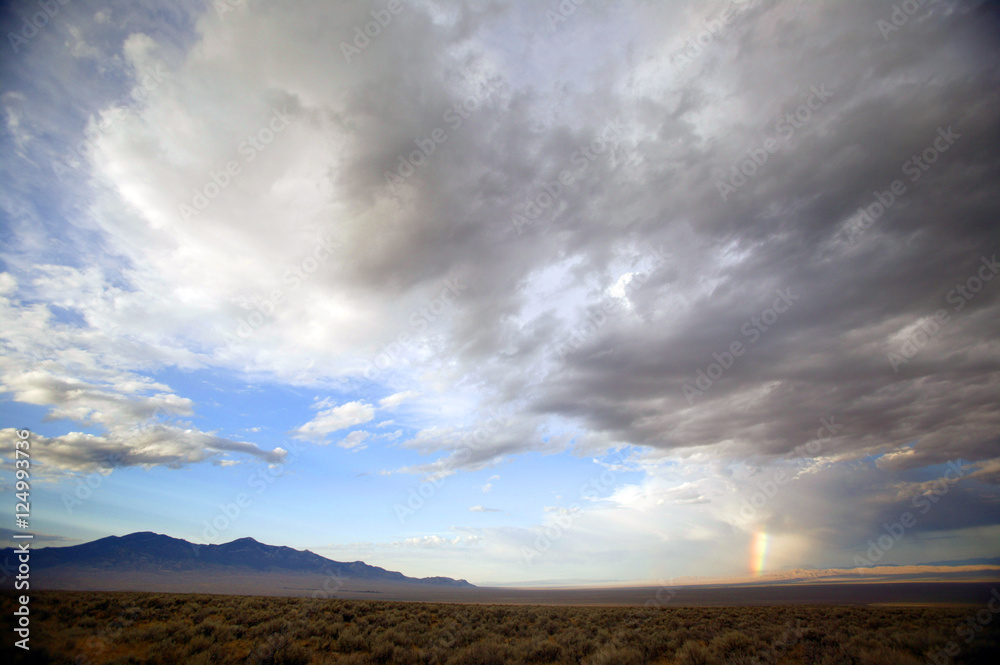 Obraz premium clouds desert n rainbow