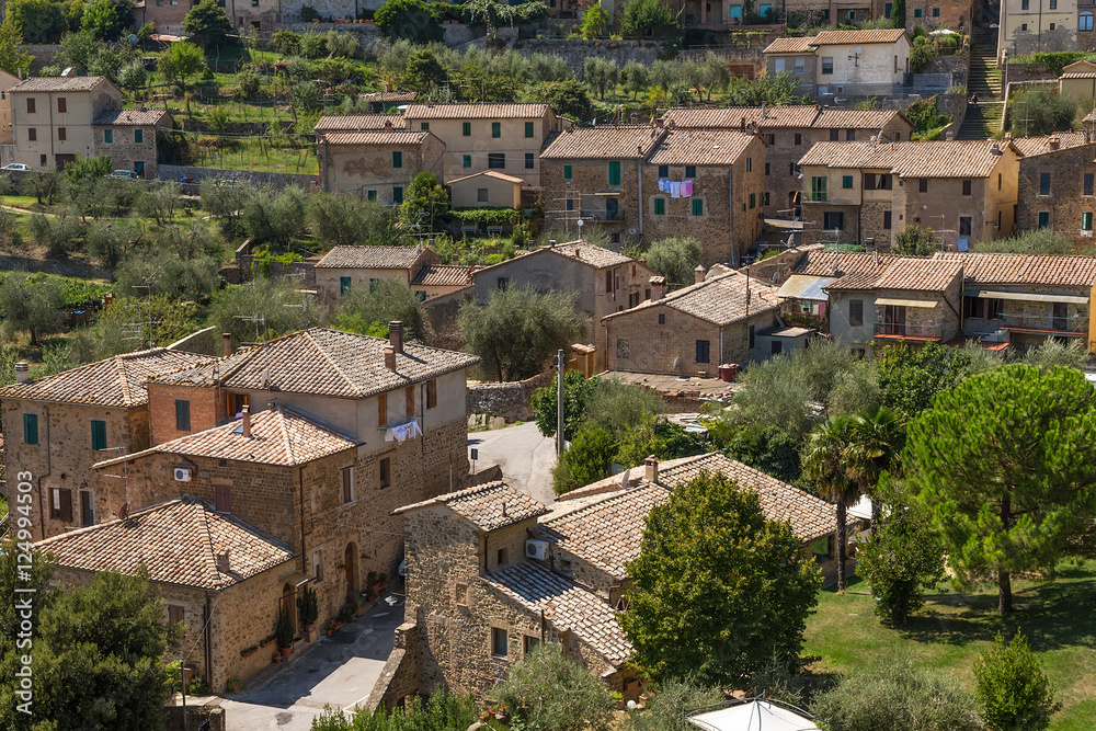Obraz premium Montalcino, Italy. Buildings on the hillside