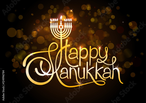 Happy Hanukkah lettering on blur bokeh background.