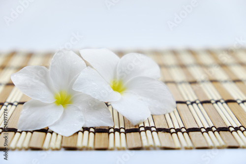 beautiful flower on bamboo background   spa